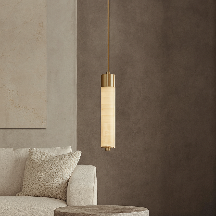 Sorella pendant with a slim pale stone cylinder beneath a warm metallic cap