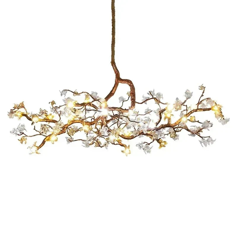 Sutober Sculptural Branch Linear Chandelier — translucent decorative elements on a bronze branch structure