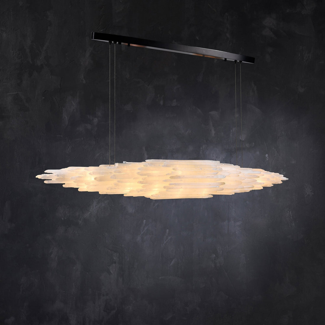 Horizontal selenite chandelier with pale overlapping elements