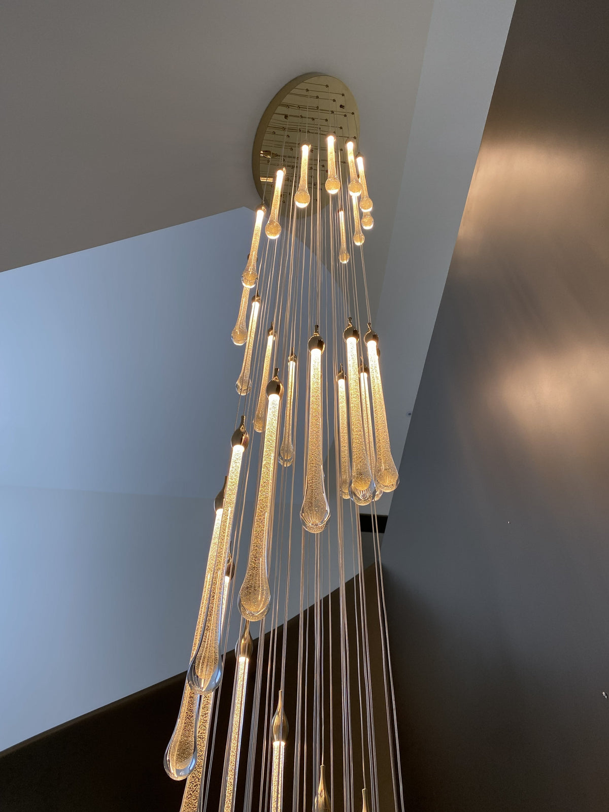 Custom Staircase Chandelier Project: Rain-Like Glass Lighting for a Spiral Staircase lighting example