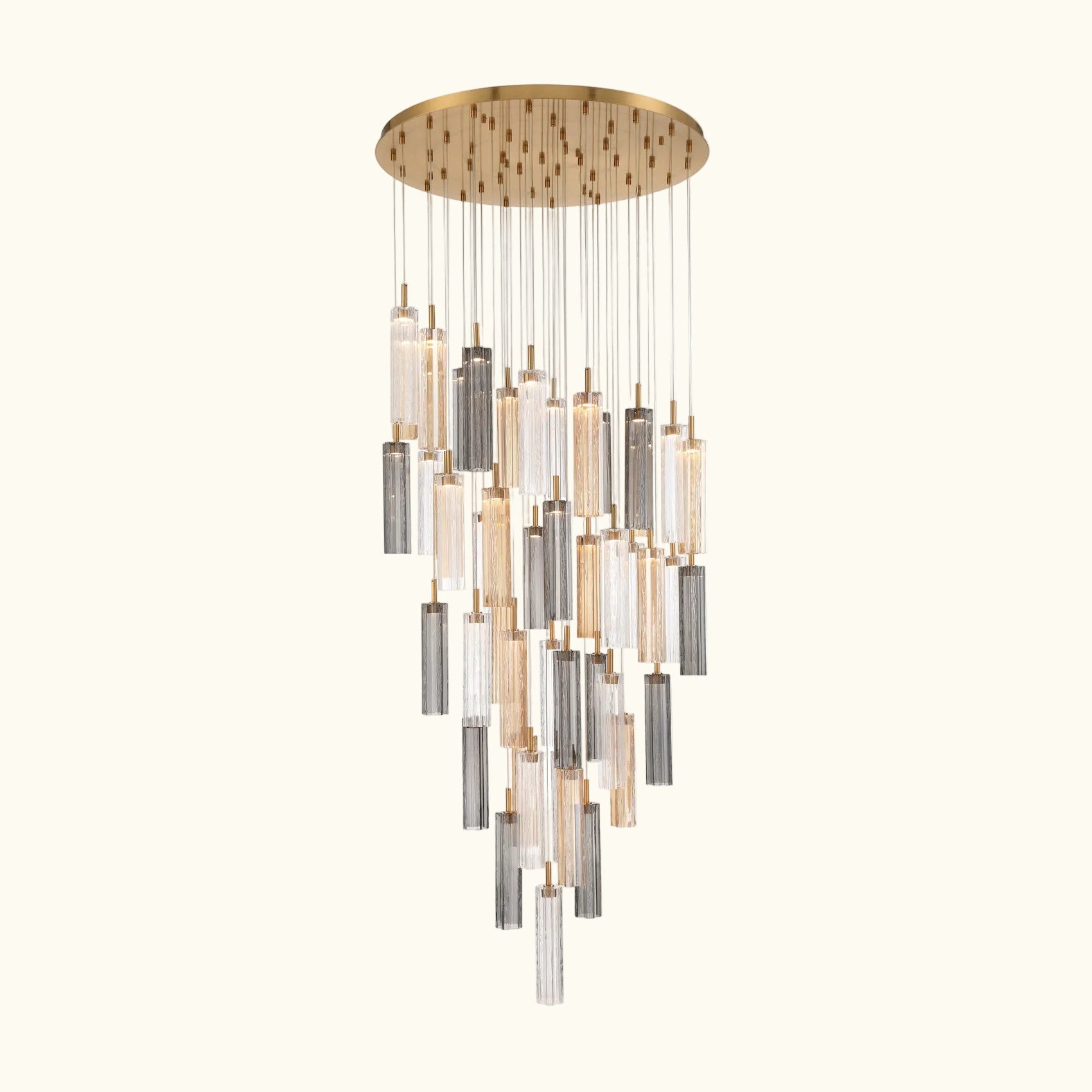 A modern multi-light chandelier with a circular gold-toned ceiling canopy, clear glass tubes, and brushed silver metal accents, suspended against a plain white background.