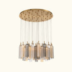 Chandelier with cylindrical glass shades and a wooden top on a white background