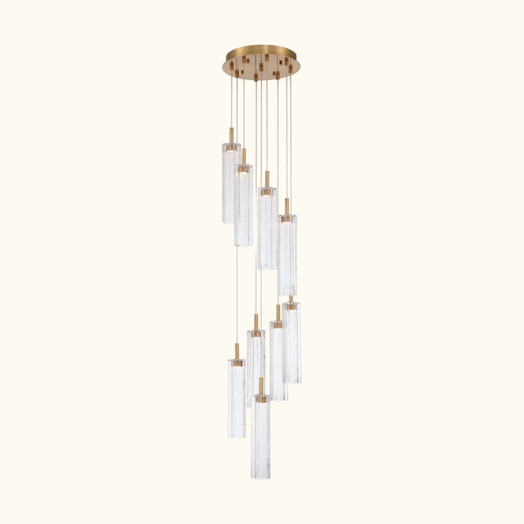 Chandelier with clear glass shades and gold accents on a white background