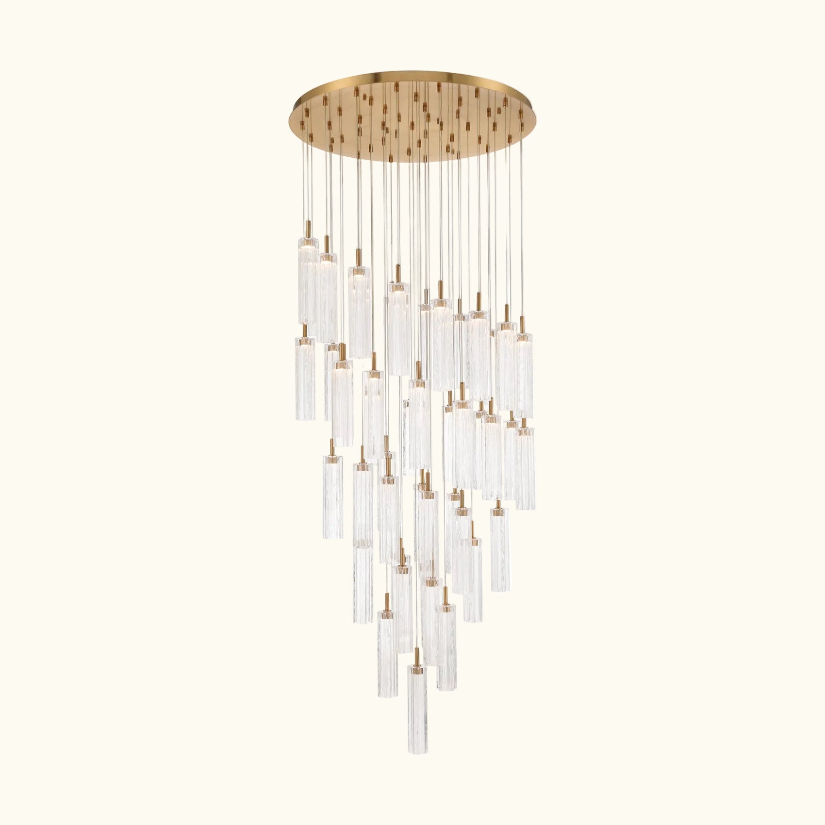 Chandelier with gold fixture and clear glass shades on a white background