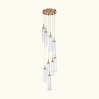 Chandelier with clear glass shades and gold accents on a white background