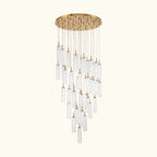 Chandelier with gold fixture and clear glass tubes on a white background