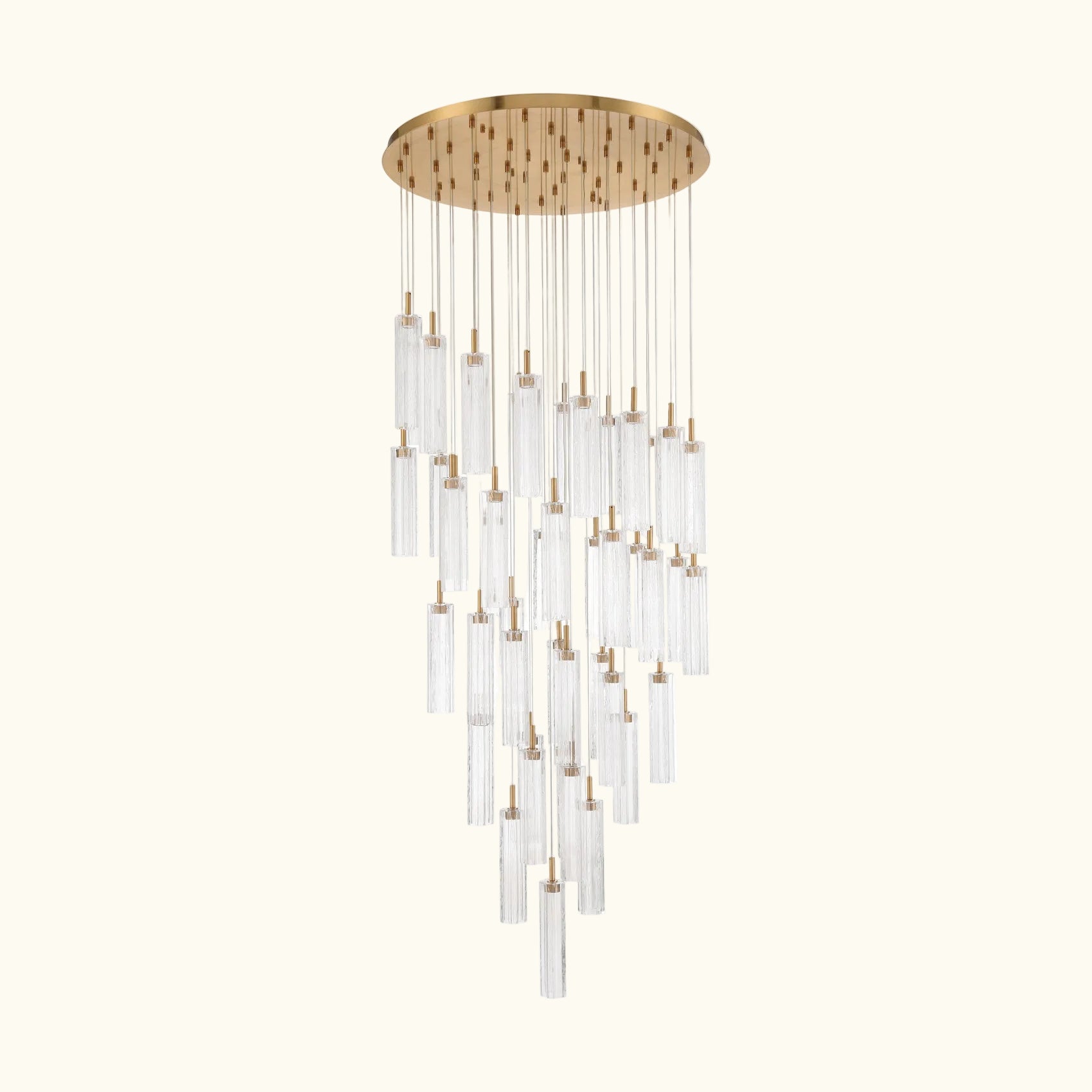 Chandelier with gold fixture and clear glass tubes on a white background