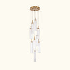 Chandelier with clear glass shades and gold accents on a white background