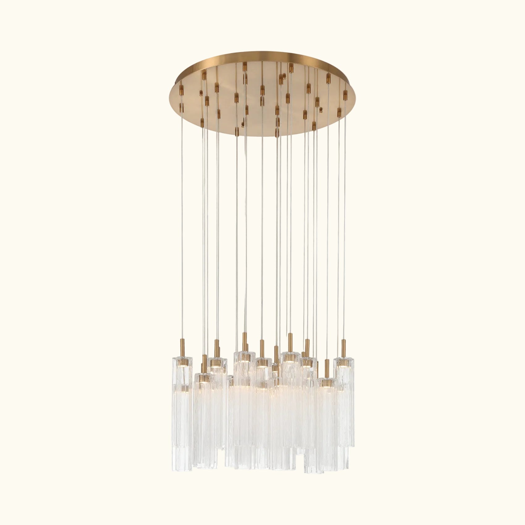 Gold pendant with a long cylindrical bar and circular top on a white background