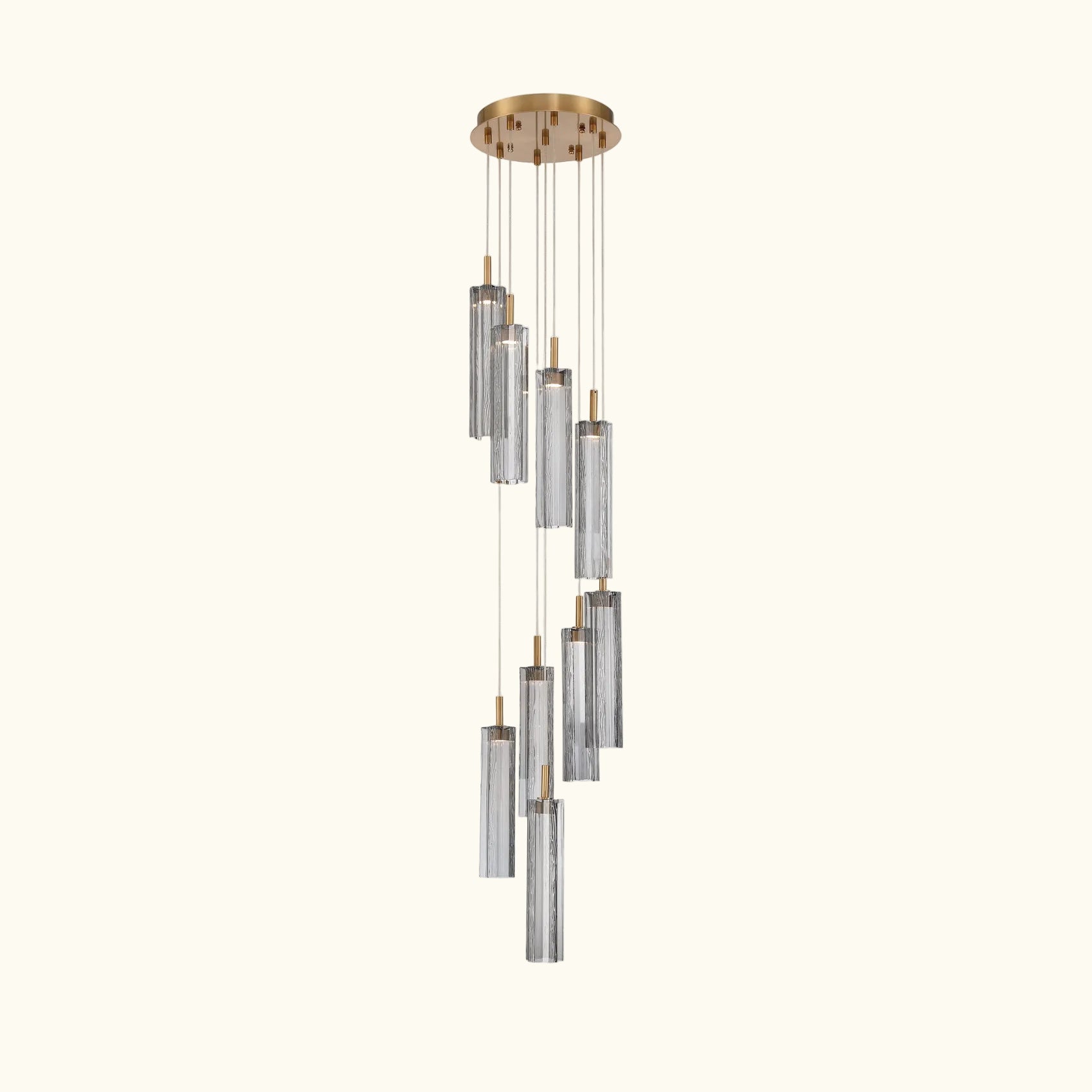 Modern chandelier with cylindrical glass shades on a white background