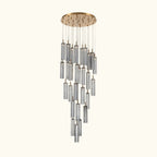Chandelier with cylindrical glass shades on a white background