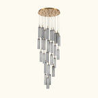 Chandelier with cylindrical glass shades on a white background