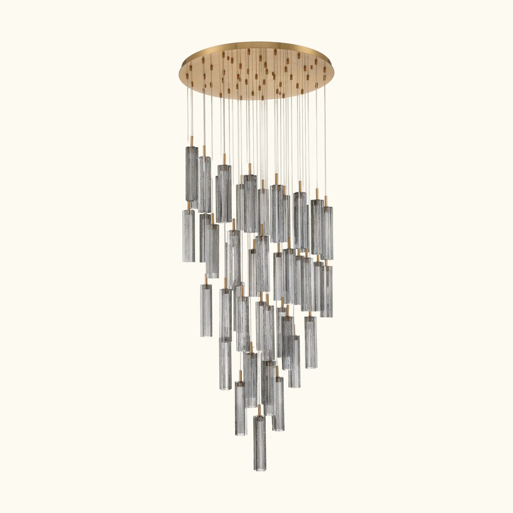 Chandelier with cylindrical metal shades on a white background