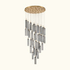 Chandelier with cylindrical metal shades on a white background