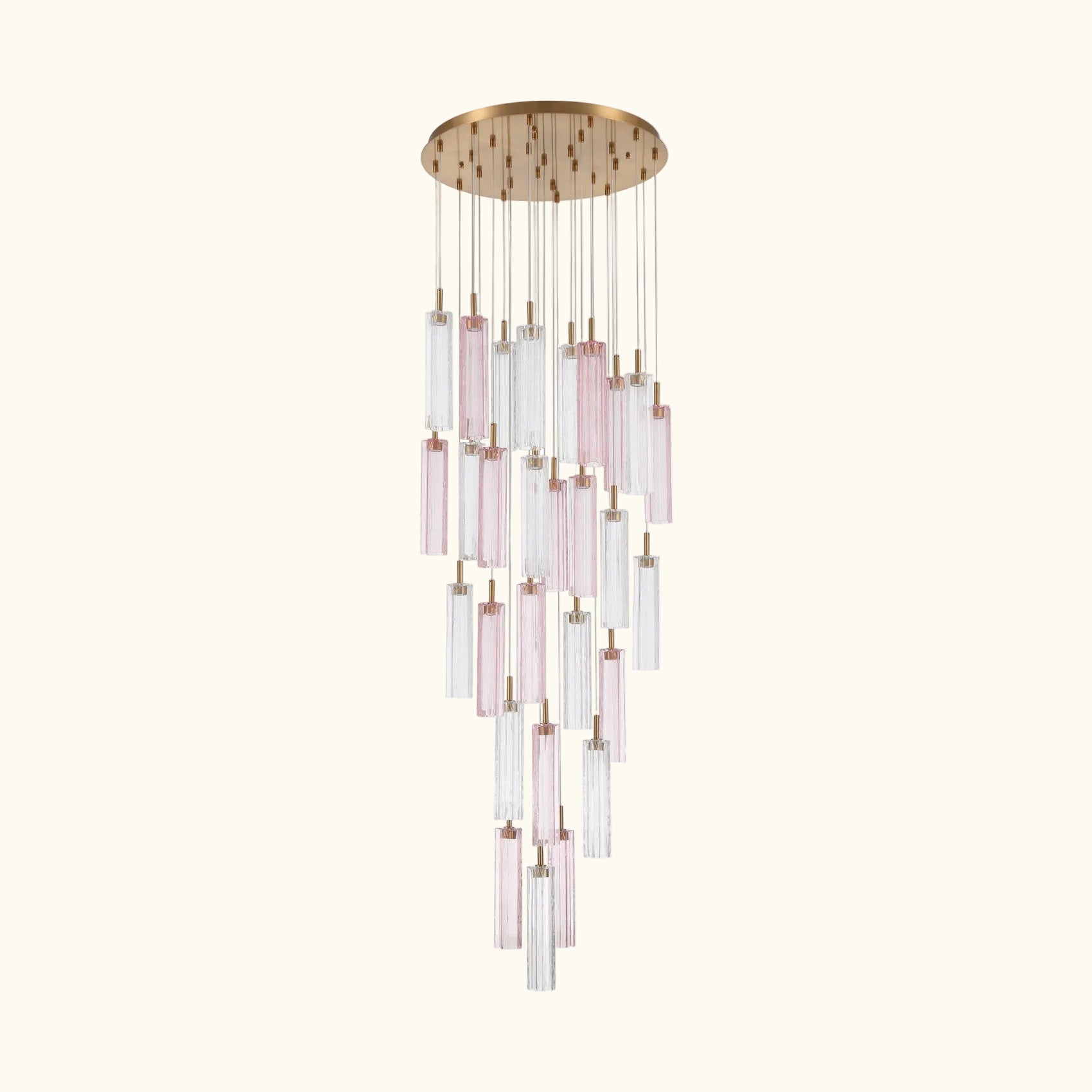 A modern multi-light chandelier with a round gold-toned ceiling canopy, featuring multiple clear glass cylinder shades and several pink-tinted glass tubes suspended at varying lengths against a white background.