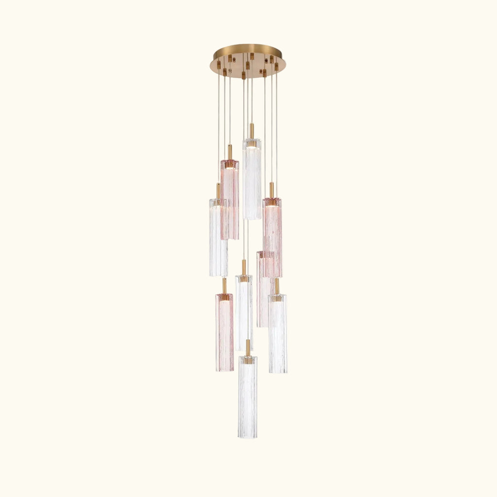 Modern chandelier with glass shades and gold accents on a white background