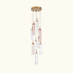 Modern chandelier with glass shades and gold accents on a white background