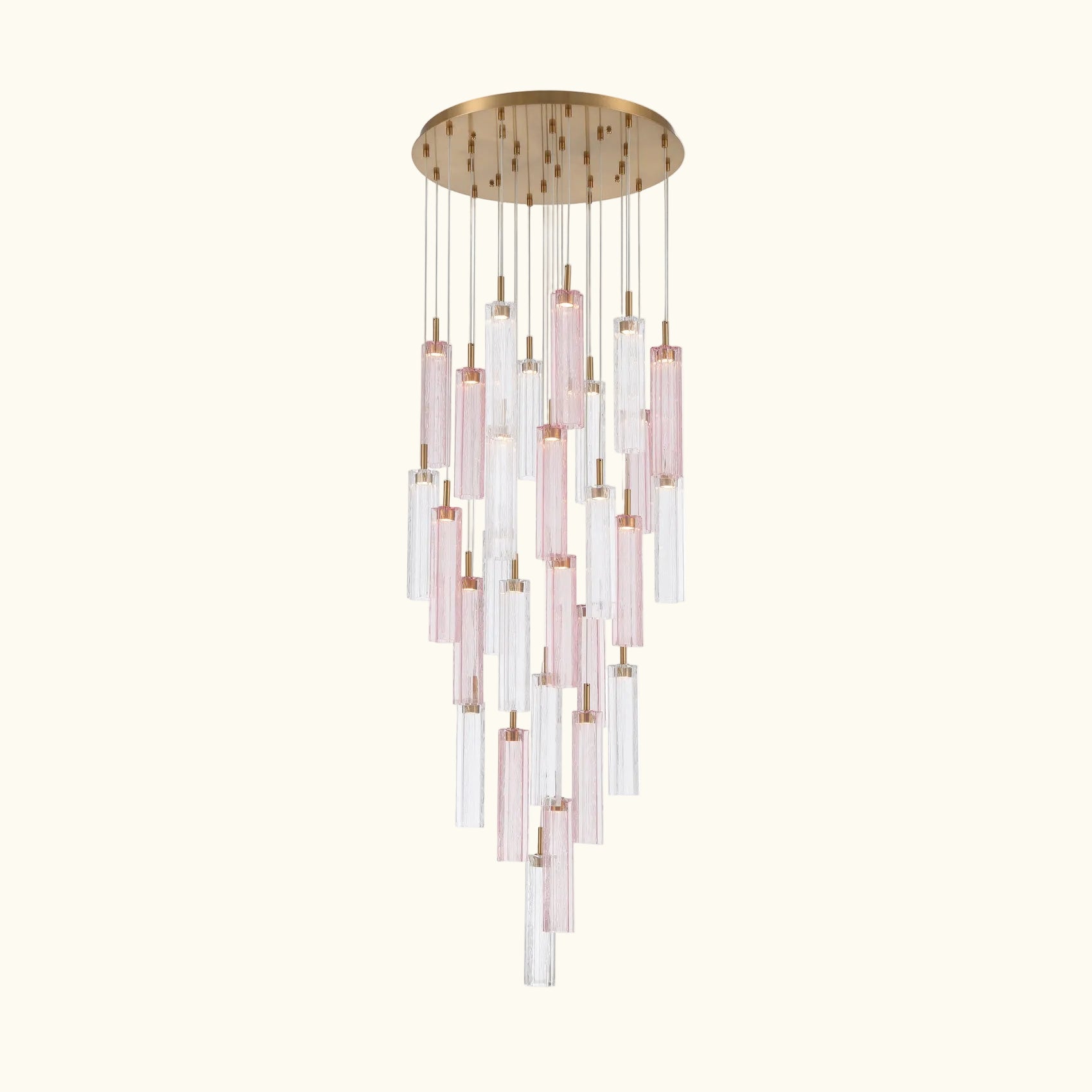A modern multi-light linear chandelier featuring a round brushed gold ceiling canopy, clear glass tubes, and pink-tinted glass tubes suspended in a cascading, tiered arrangement.
