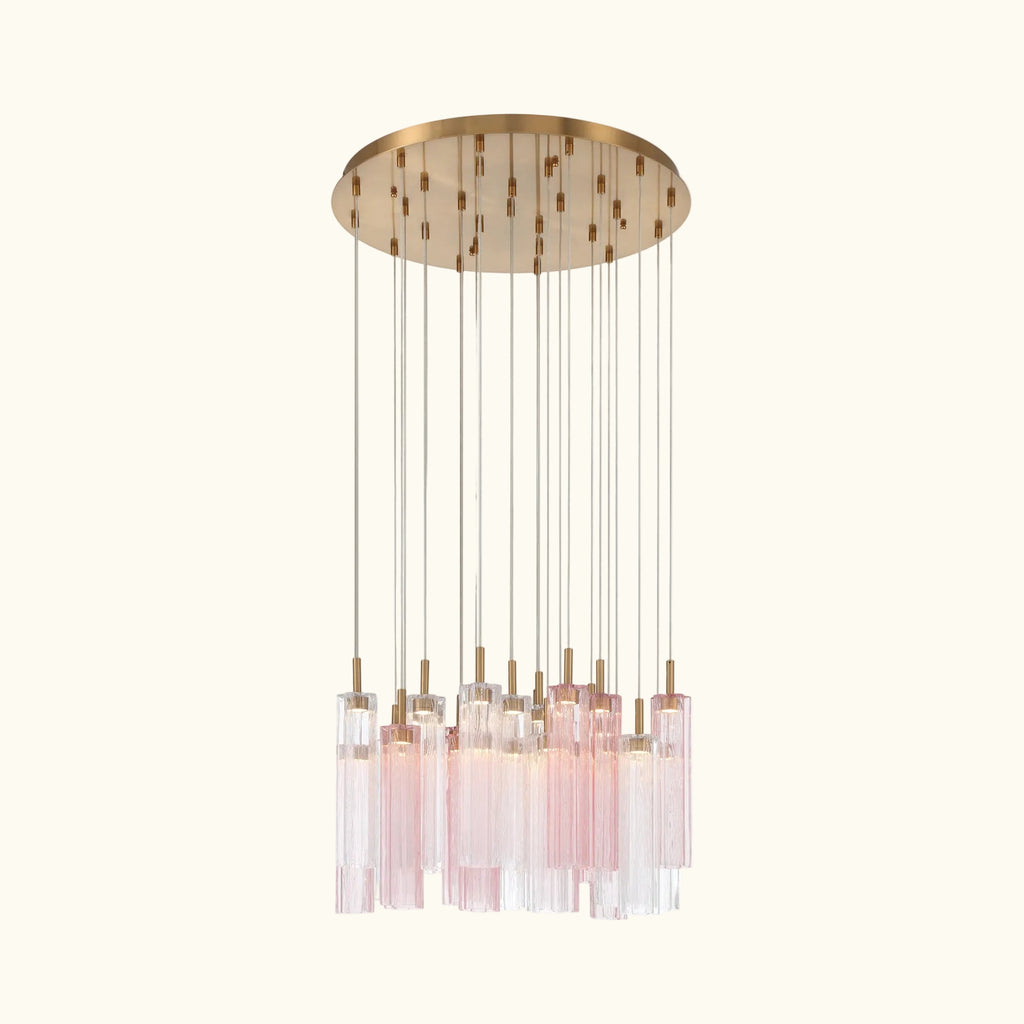 A modern multi-light linear chandelier with a circular gold-toned ceiling canopy, multiple thin vertical rods, and clear glass shades with a soft pink tint, shown against a plain white background.