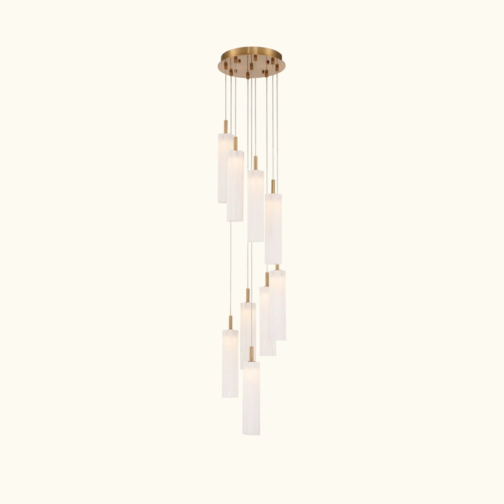 Modern pendant light with cylindrical glass shades on a white background