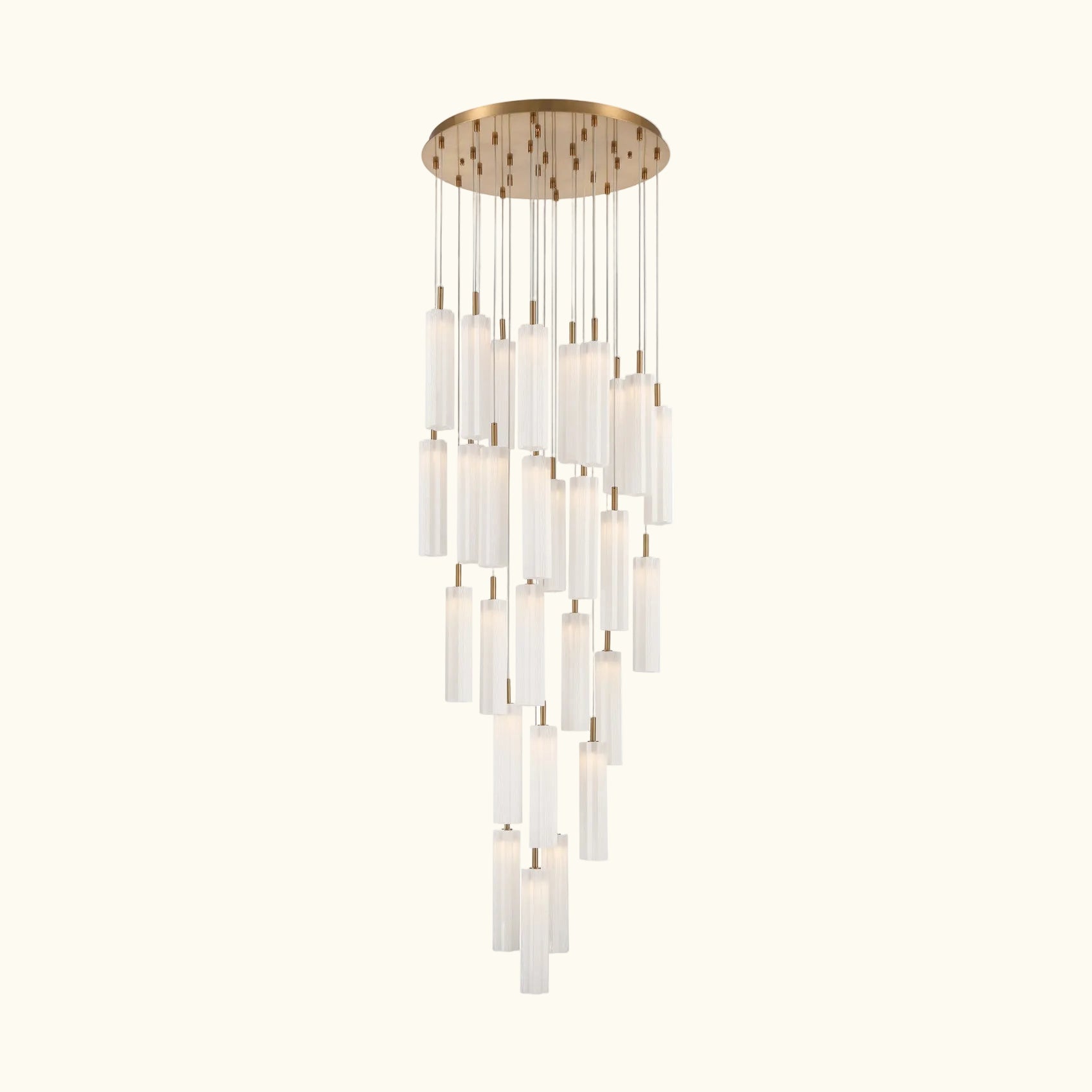 A modern multi-light chandelier with a brushed gold circular canopy and multiple clear cylindrical glass shades of varying lengths, suspended against a plain white background.