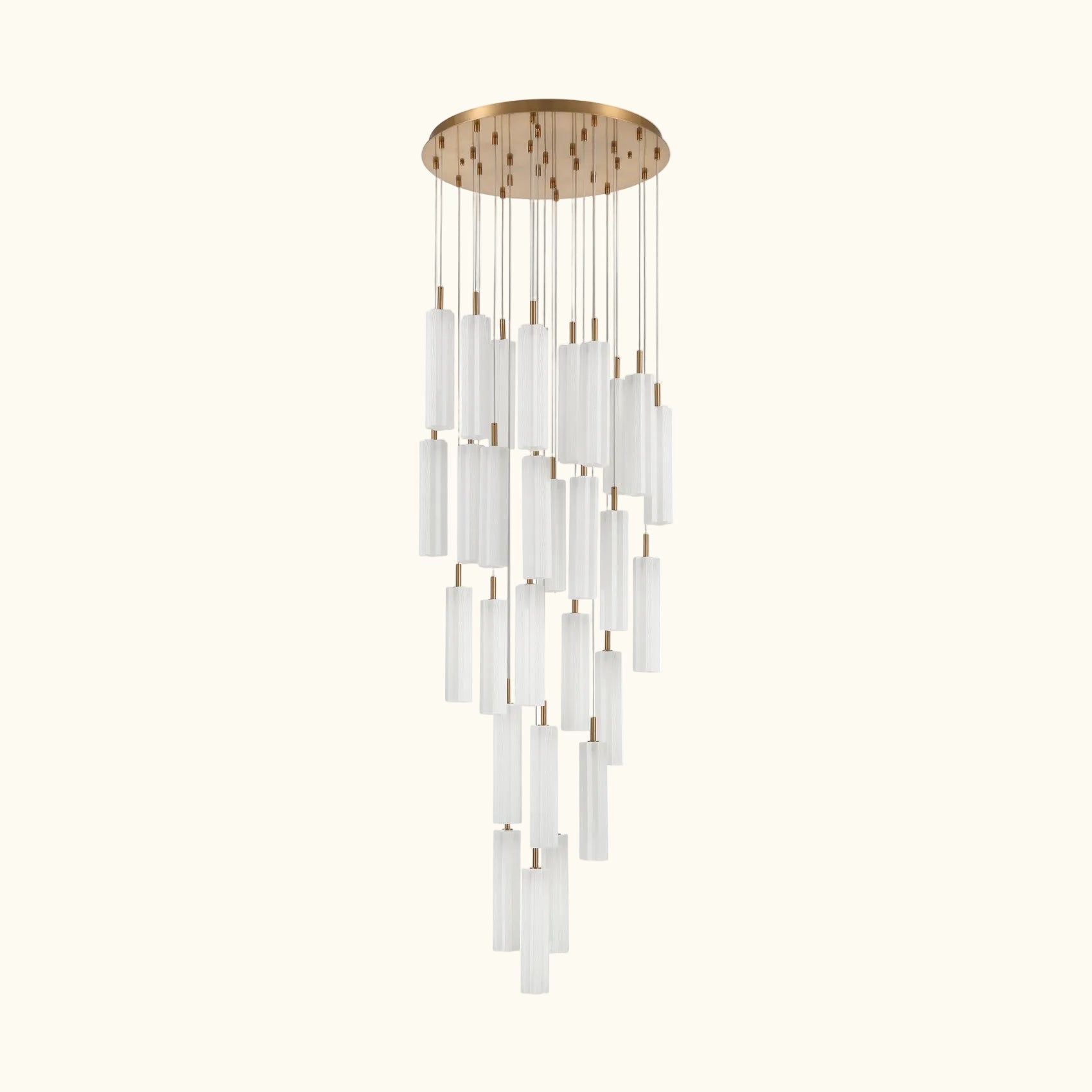 A modern multi-light linear chandelier with a brushed gold circular canopy and multiple clear cylindrical glass shades of varying lengths, suspended against a plain white background.