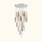 Modern chandelier with cylindrical glass shades on a white background