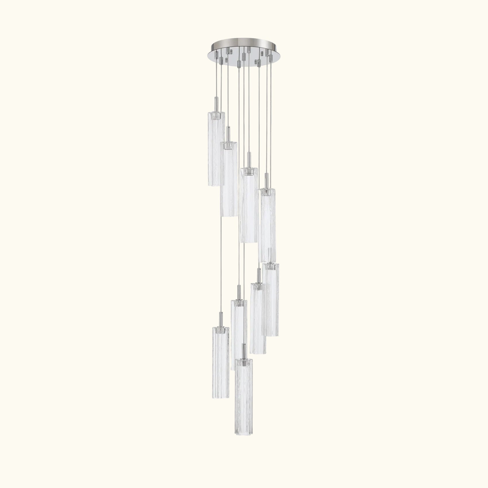 A modern multi-light linear chandelier with clear cylindrical glass shades and a polished silver-tone metal canopy and cords, shown against a plain white background.