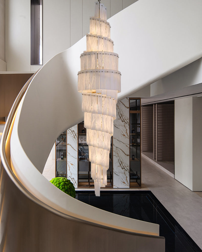 Tiered Alabaster Staircase Chandelier chandelier in a tall interior