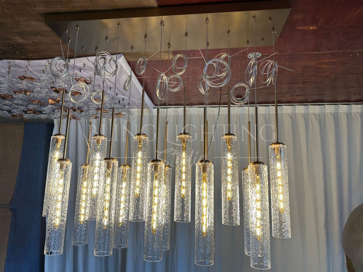 Colleena linear hammered glass chandelier showing the rectangular canopy and layered pendant drops