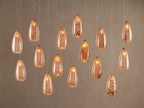 Edda Cascade Teardrop Mercury Glass Linear Chandelier 48'' 54''L by Bling Lighting Studio