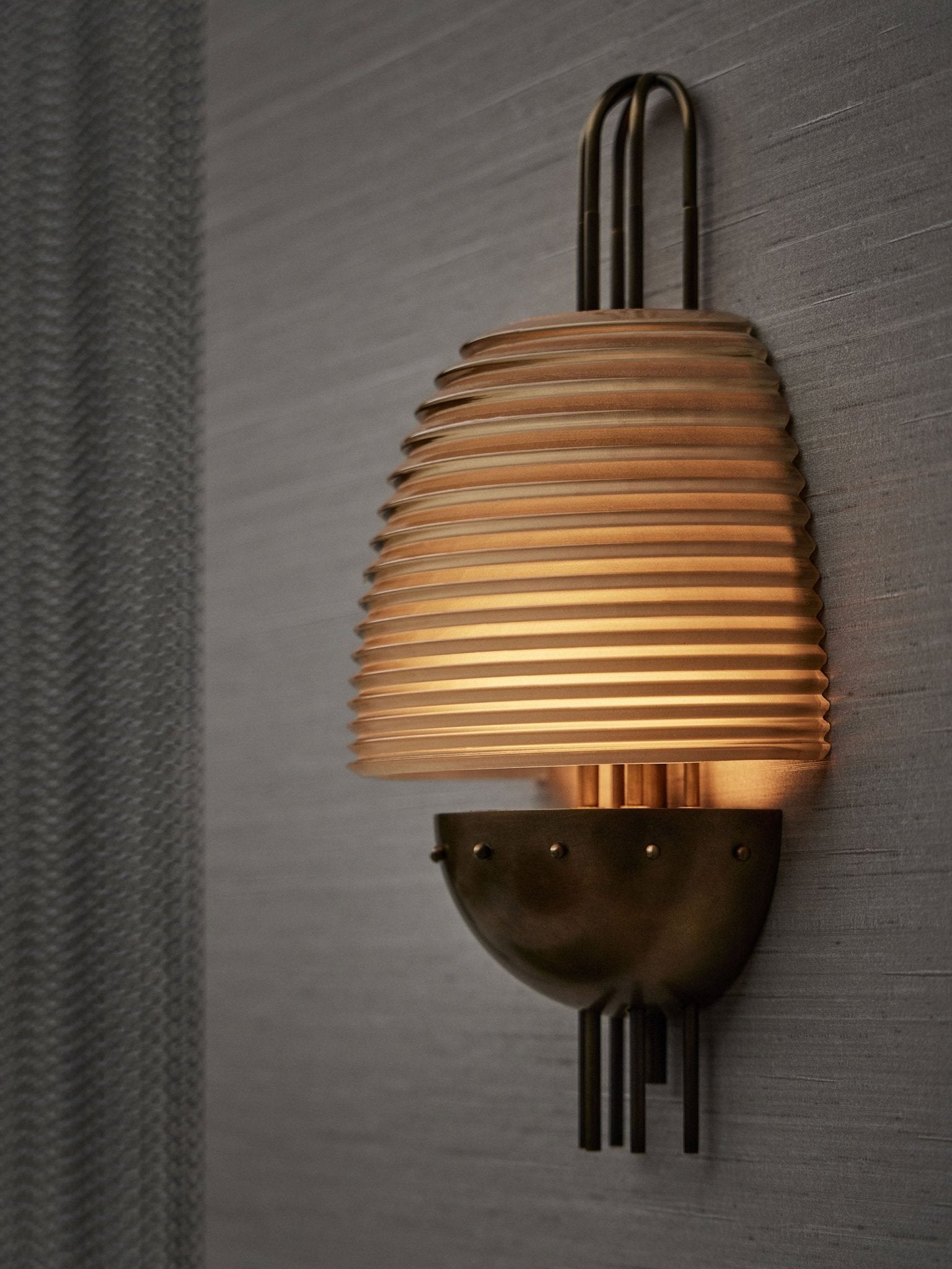 Arclune Ribbed Wall Lamp by Bling Lighting Studio