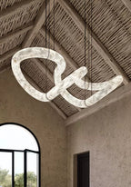 Streamlined Alabaster Linear And Curved Chandelier