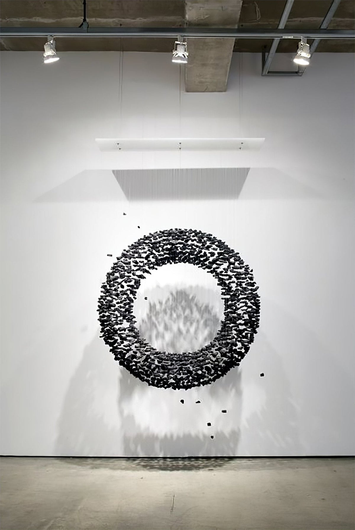 The Charcoal Halo LED Chandelier | Custom Size & Made-to-Order Lighting for Luxury Homes & Commercial Spaces chandelier in a tall interior