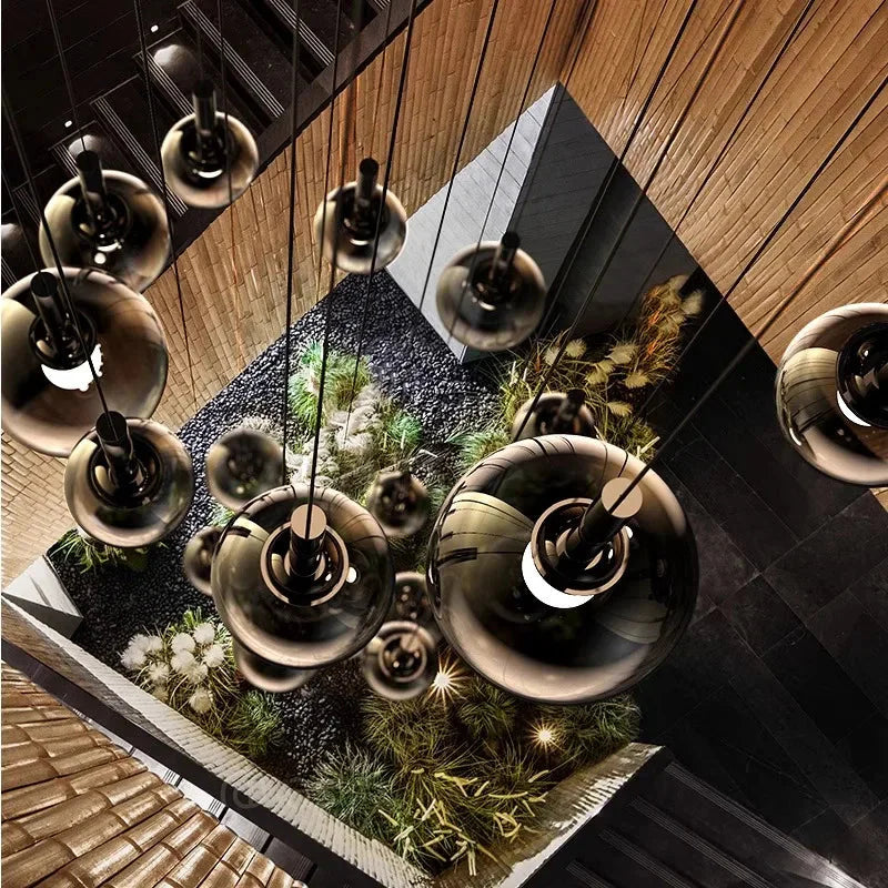 Cleo Bubble Staircase Chandelier for high ceiling staircase and foyer lighting