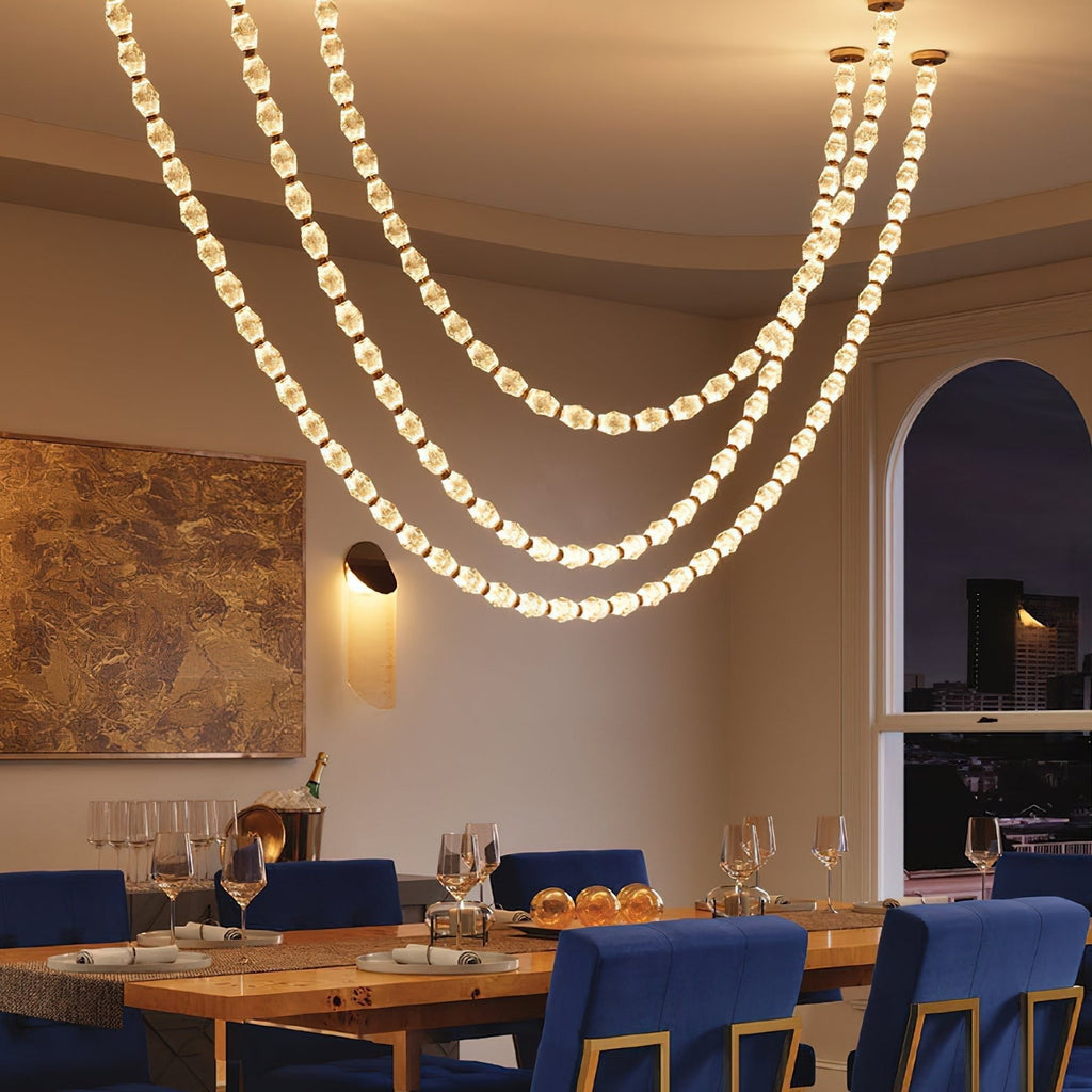 Riviere Glass Chain Chandelier installed above a dining table