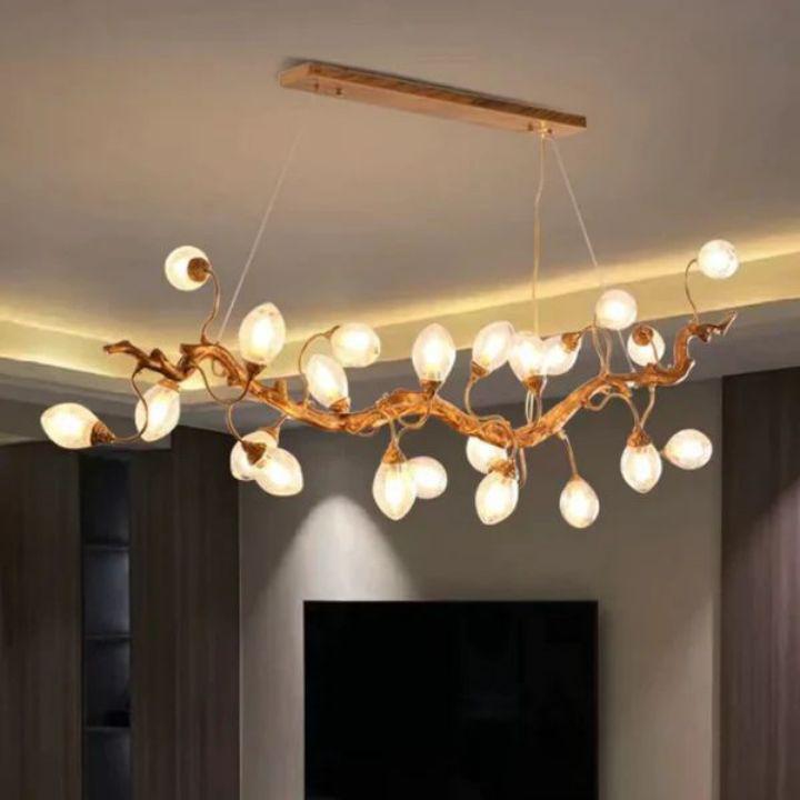 Levi Brass Branch Chandelier chandelier in a tall interior