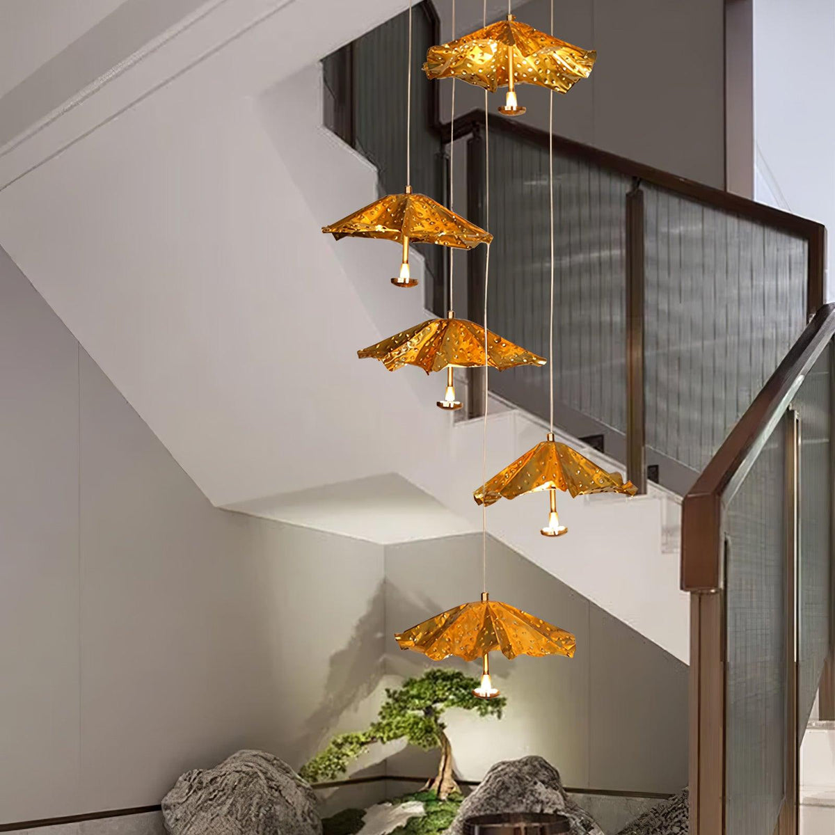 Livra Leaf Chandelier chandelier in a tall interior