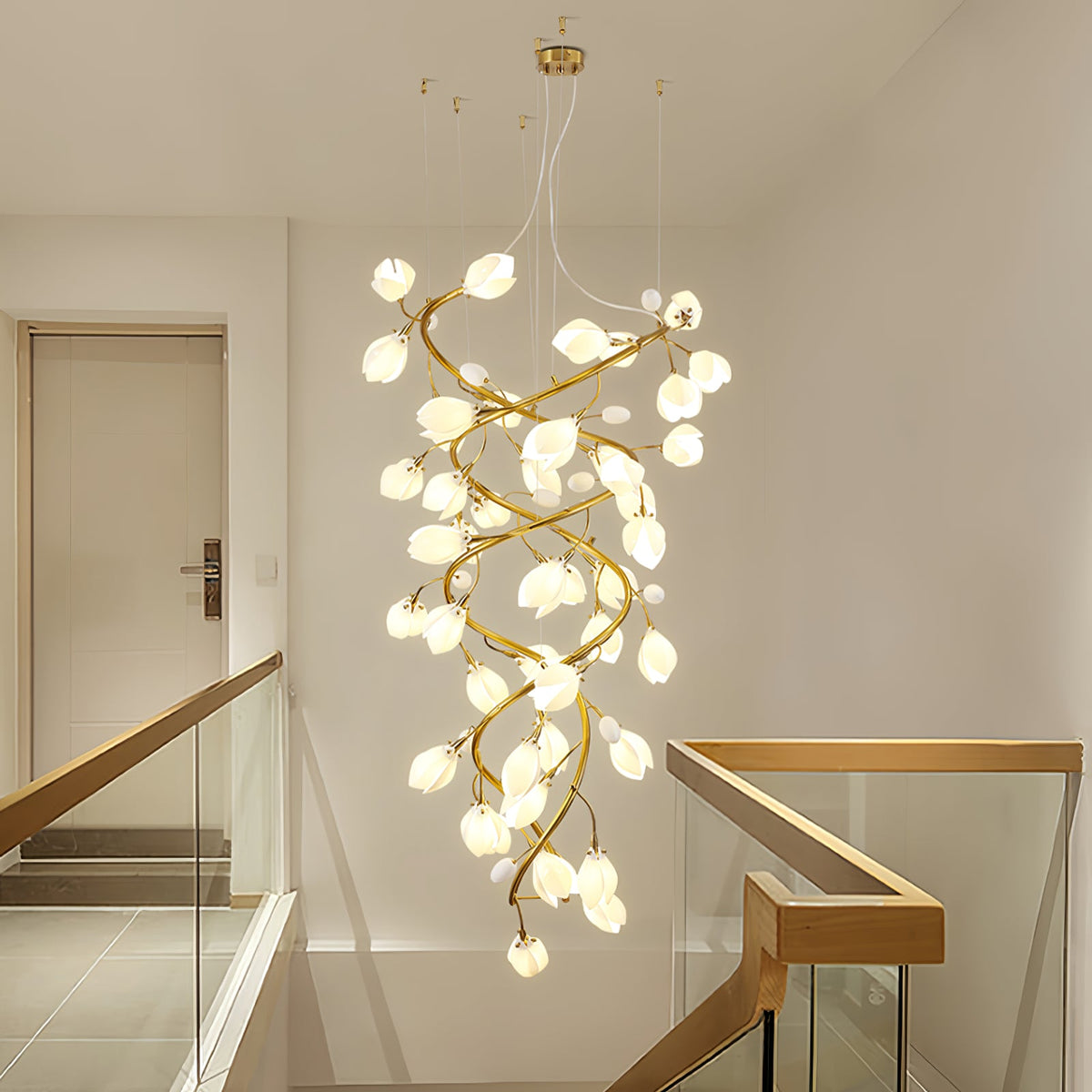 Lysandra Cascade Stairs Chandelier chandelier in a tall interior