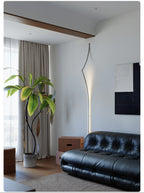 Minimalist Curving Ribbon LED Wall Sconce by Bling Lighting Studio