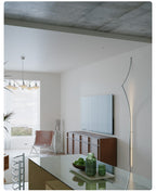 Minimalist Curving Ribbon LED Wall Sconce by Bling Lighting Studio