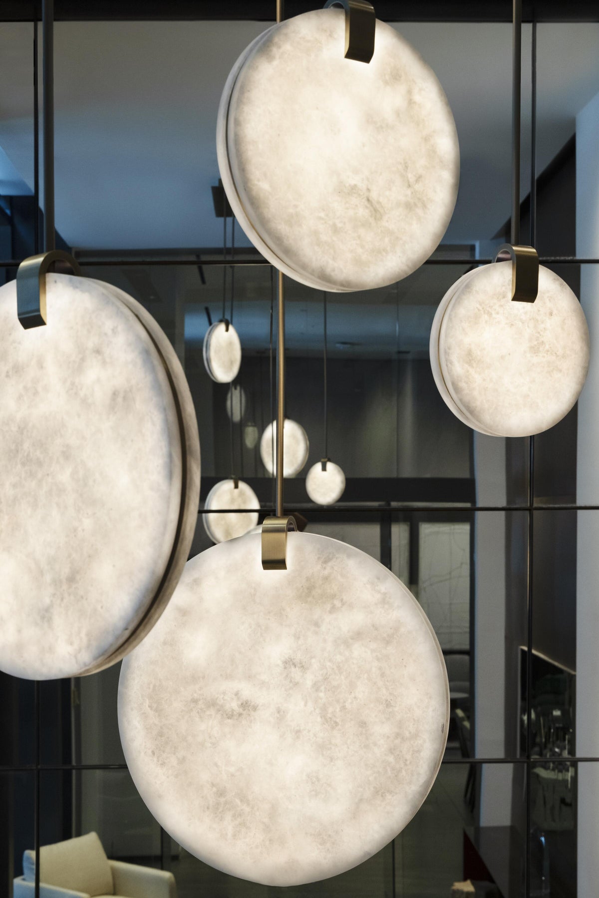 Alabaster Soho Chandelier chandelier in a tall interior