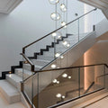 Postmodern Ring Pendant Light for Staircase for high ceiling staircase and foyer lighting