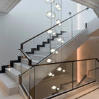 Postmodern Ring Pendant Light for Staircase for high ceiling staircase and foyer lighting