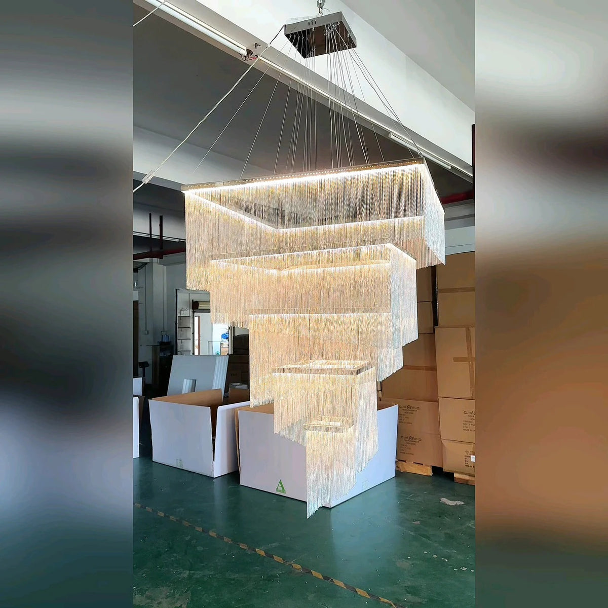 Aisha Tassel Chandelier multi-tier aluminum chain tassel chandelier installation view