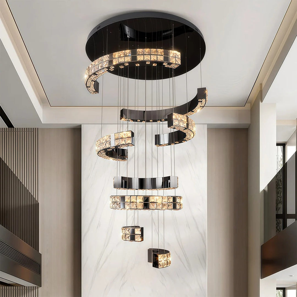 Aysha Black Crystal High Ceiling Entryway Light Fixture installed beside a staircase with cascading crystal strands