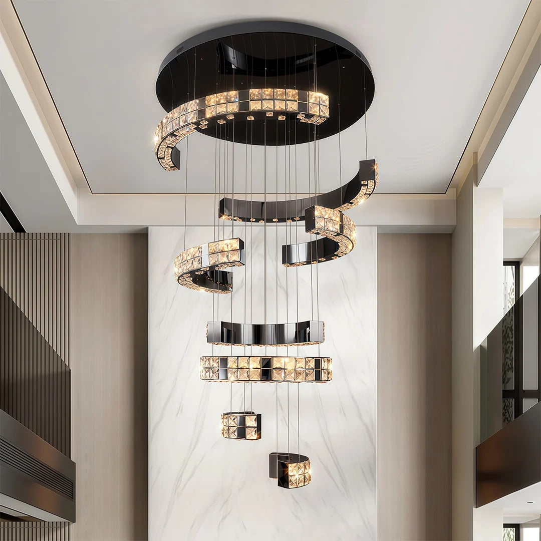 Aysha Black Crystal High Ceiling Entryway Light Fixture installed beside a staircase with cascading crystal strands