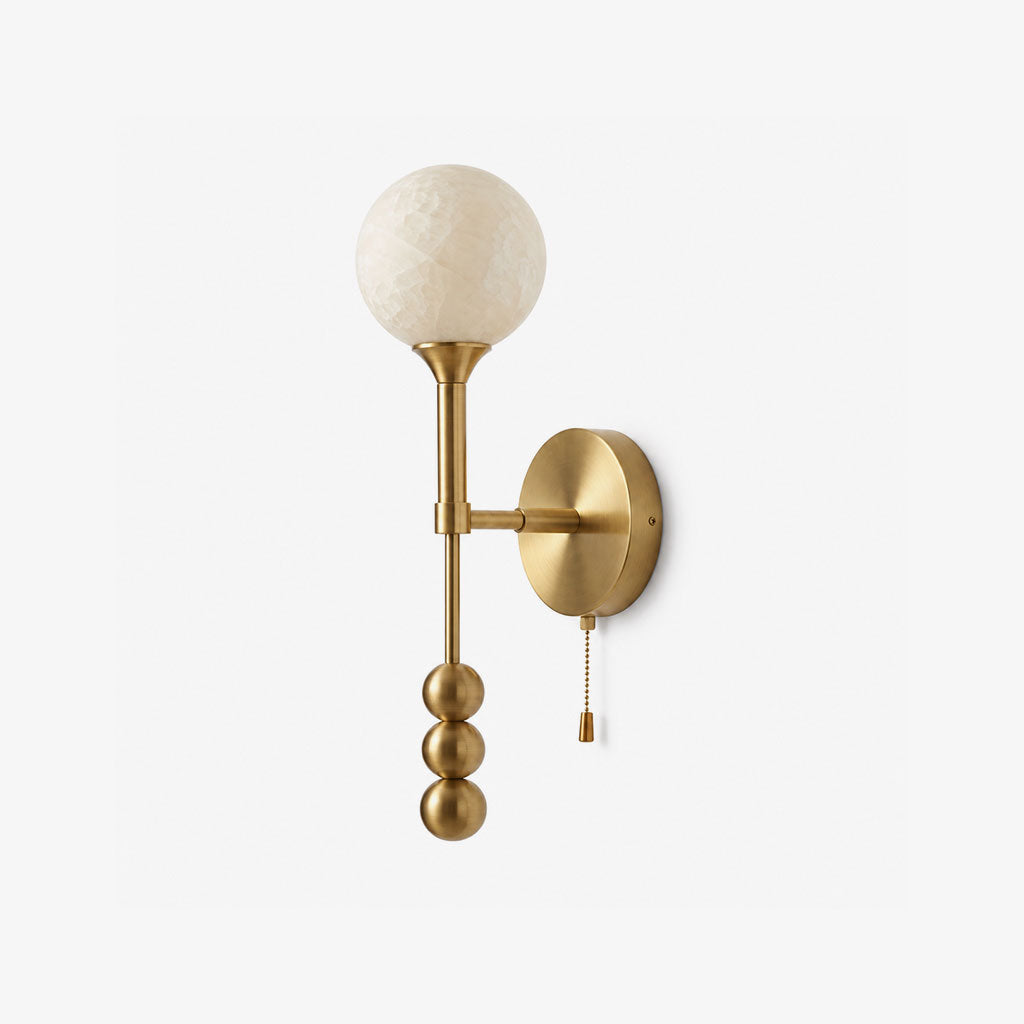 Abacus Alabaster Wall Sconce — full fixture profile, a stone globe above a diagonal arm and decorative metal beads (view 1)