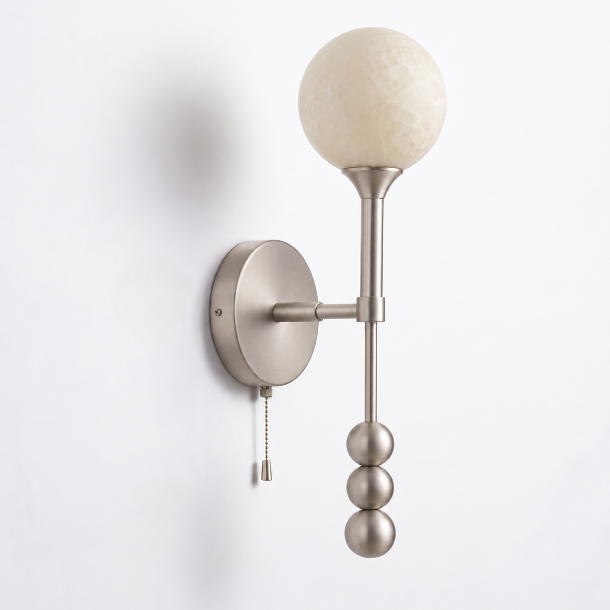 Abacus Alabaster Wall Sconce — additional product view, a stone globe above a diagonal arm and decorative metal beads (view 5)