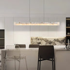 Alabaster LED Linear Pendant Light — product setting and fixture profile, a linear stone diffuser beneath slim suspension hardware (view 2)